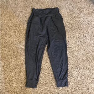Woman’s size small Under Armour loose fit Jogger Pants. Navy heather in color.